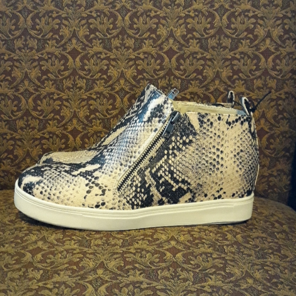 Snakeskin wedge booties